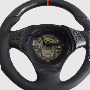 bmw e90 oem steering wheel.BLACK CARBON
